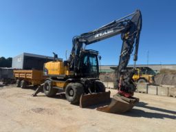 Grävmaskin VOLVO EW160C med vagn och 10 redskap