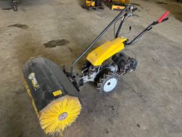 Texas redskabsbærer model Pro-Trac 555 med kost.