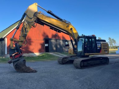 Caterpillar  326 F L rototillt med grip 