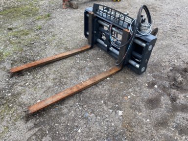 Hydraulic fork positioner and side-shift attachment