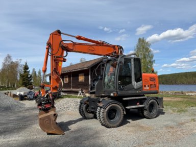 Grävmaskin Hitachi ZX 140W-3 med tiltrotator