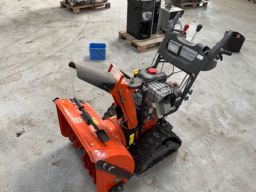 Husqvarna sneslynge på bælter, model  ST 268 EPT.